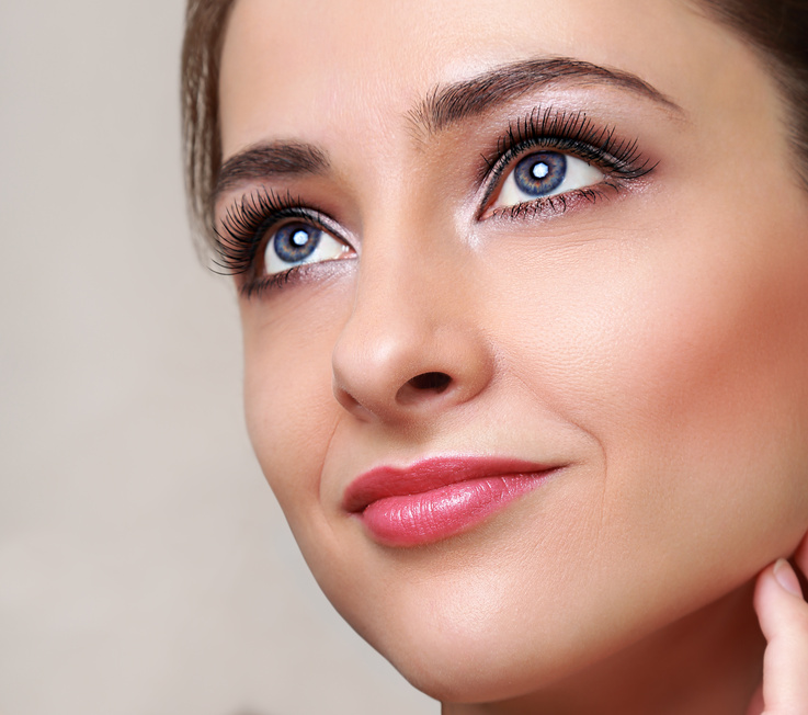 Beautiful perfect makeup woman face. Closeup